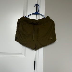 Army green Nike shorts